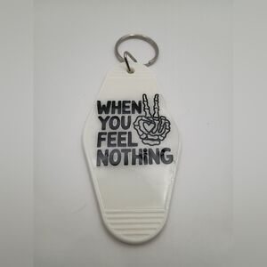 White "When You Feel Nothing" Skeleton Vintage Styled Motel Keychain Keyring